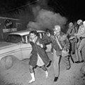 7 A Mississippi highway patrolman moves a young demonstrator who took refuge in a car when tear gas was used to disperse some 2,000 demonstrators at the entrance of Alcorn A&M College at Lorman, Mississippi, on April 6, 1966 - AP.jpg